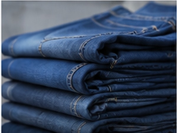 Folded stack of denim fabric for the Fashion Weaves Garments Denim & Casuals category